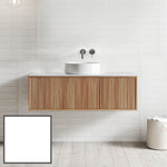Ingrain Grooved wall-hung vanity in Ash woodgrain with fluted front, shown in a bathroom with above-counter basin.