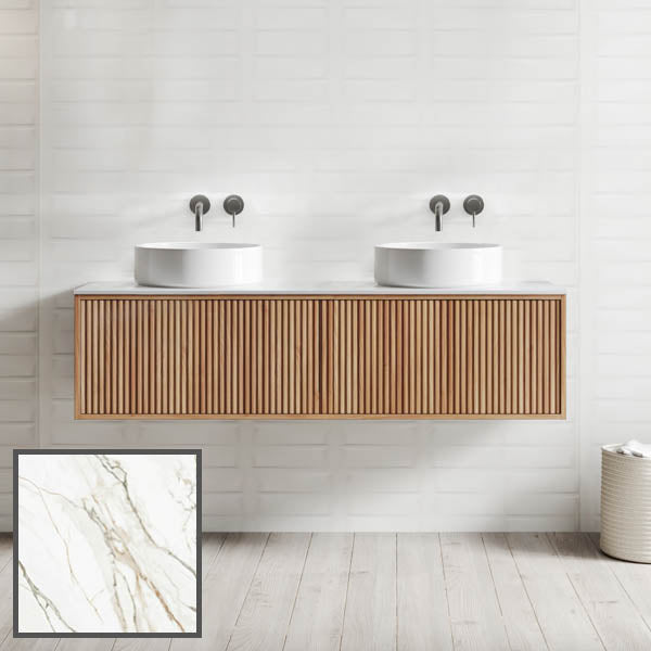Ingrain grooved wall hung vanity in ash woodgrain with twin round above-counter basins in a bright bathroom setting