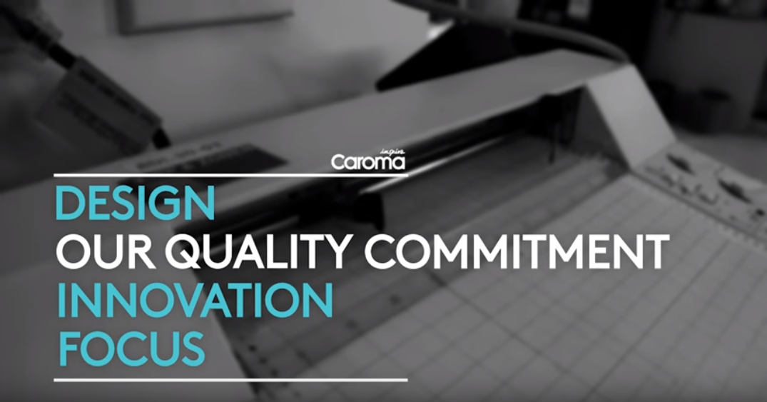 Caroma branding graphic with “Design, our quality commitment, innovation, focus” over a blurred technical drawing background