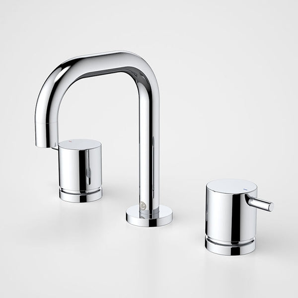 Caroma Luna chrome 3 piece basin tap set with rounded lever handles and curved spout on white background
