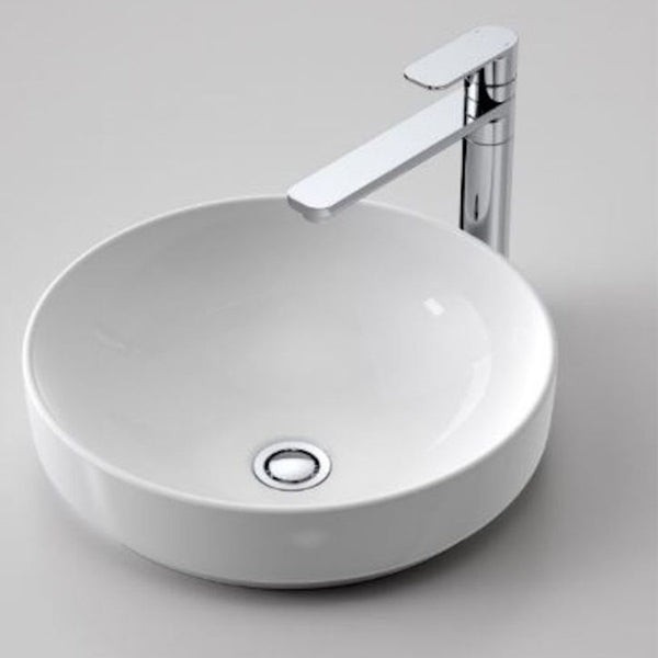 Caroma Tribute round inset basin in gloss white ceramic, shown with chrome mixer tap on a grey benchtop