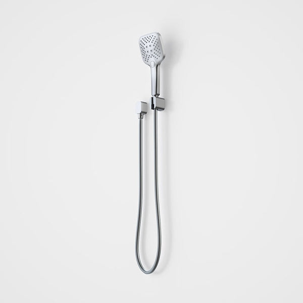 Caroma Luna chrome multifunctional hand shower with square handset, holder and hose on a white background