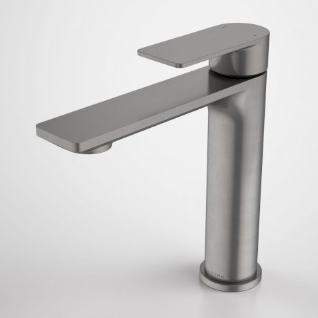 Caroma Urbane II mid tower basin mixer in gunmetal, with a slim round body and flat lever spout on white background