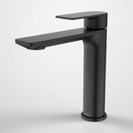 Caroma Urbane II matte black mid tower basin mixer tap, side view on white background