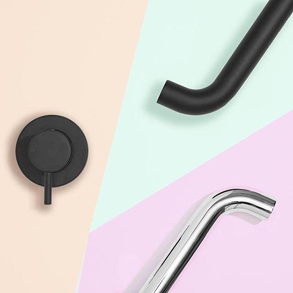 Clark round basin/bath outlet in matte black, shown with chrome and black alternate finishes on pastel background
