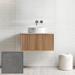 Ingrain Grooved wall-hung vanity in ash timber grain with fluted drawer front and white basin, bathroom setting