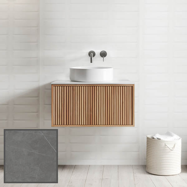 Ingrain Grooved wall-hung vanity in ash timber grain with fluted drawer front and white basin, bathroom setting