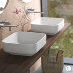 Caroma Artisan white square above-counter basin with rounded corners on a timber vanity, lifestyle view