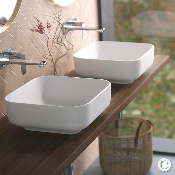 Caroma Artisan white square above-counter basin with rounded corners on a timber vanity, lifestyle view