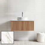 Ingrain grooved wall-hung vanity in ash woodgrain with white porcelain top and round basin, front view in bathroom setting