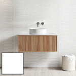 Ingrain Grooved wall hung vanity with fluted woodgrain front and white basin in a bathroom setting