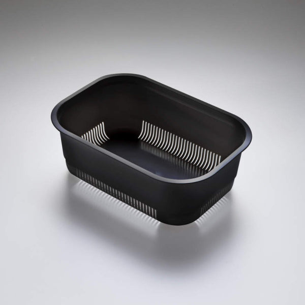 Oliveri black 1/2 bowl sink colander, rectangular kitchen accessory with slotted sides on grey background