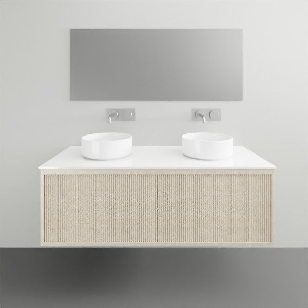 ADP Clifton wall-hung vanity with white Caesarstone top and coastal oak woodgrain front, shown with twin basins and mirror cabinetry.