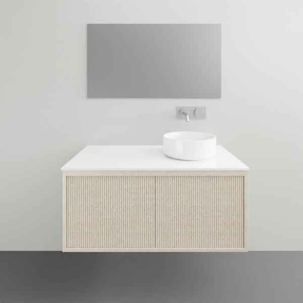 ADP Clifton wall-hung vanity with white Caesarstone top and ribbed woodgrain front, shown with left offset basin.