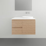 ADP Glacier Lite wall hung vanity with white top, oak woodgrain finish and left bowl in bathroom setting