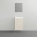 ADP Petite wall hung vanity with white top and light woodgrain cabinet, front view in a minimalist bathroom setting