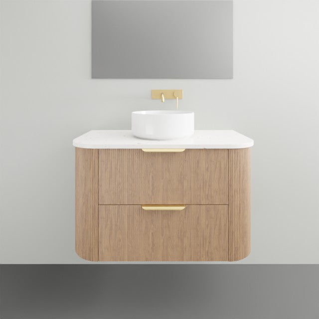 ADP Thirroul wall hung vanity with Caesarstone top, curved wood finish cabinet and white above-counter basin under gold tapware