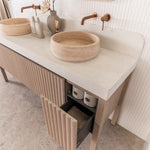 ADP Harper floor standing vanity with fluted timber-look drawers and light stone top, shown in a bathroom setting