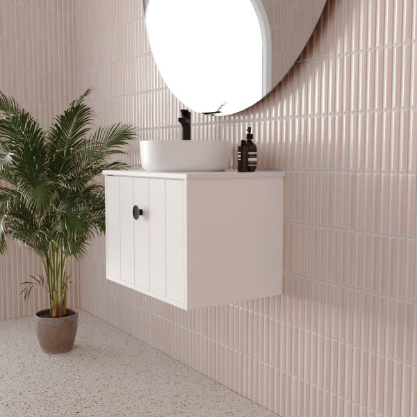 Marquis Anna wall-hung ensuite vanity in matte white, with basin and round mirror, shown in a bathroom setting