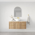 Marquis Arco wall hung vanity in prime oak with white top, round basin and brushed brass handle, front view