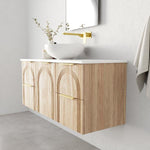 Marquis Arco wall hung vanity in prime oak finish with white top, arched front detail and brushed brass handles