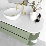 Marquis Avion wall hung vanity with white basin, curved shelf end, white top and green cabinet finish, angled view