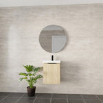 Marquis Caleta compact wall hung vanity in coastal oak with white top and black tap, styled in a modern bathroom