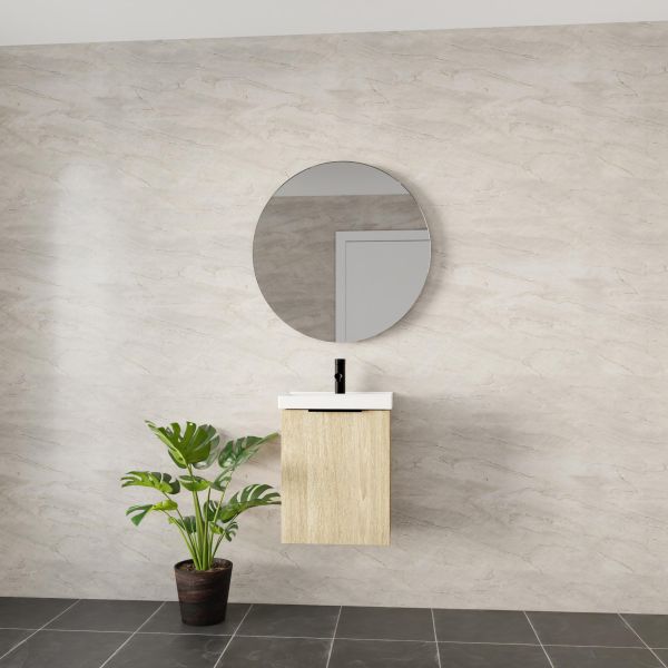 Marquis Caleta compact wall hung vanity in coastal oak with white top and black tap, styled in a modern bathroom
