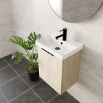 Marquis Caleta compact wall hung vanity in coastal oak with white ceramic top and black handle in bathroom setting