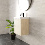 Marquis Caleta compact wall hung vanity, coastal oak finish with white ceramic top, shown in a modern ensuite setting