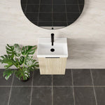 Marquis Caleta compact wall hung vanity in coastal oak with white ceramic top and black tapware in a bathroom setting