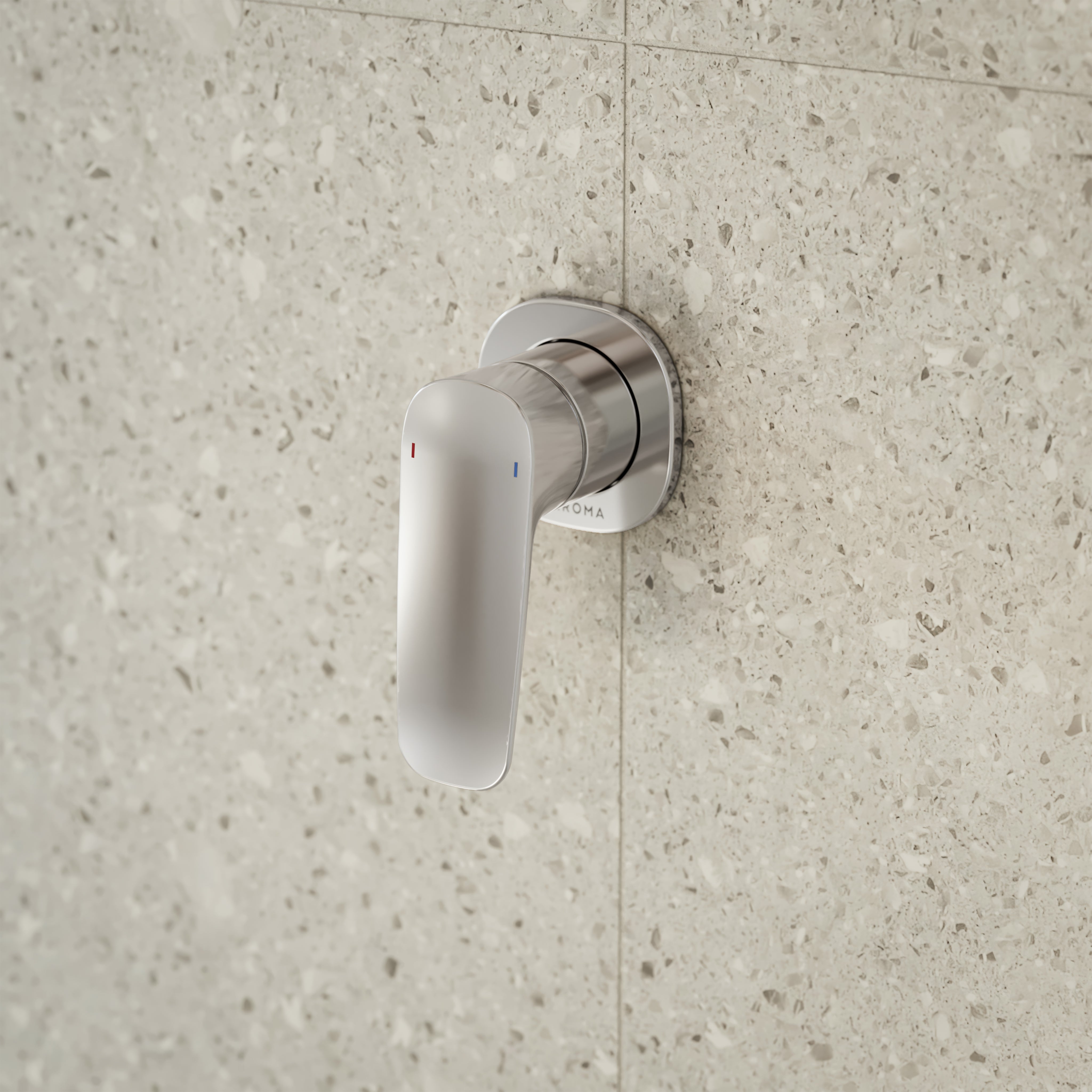 Caroma Contura II chrome bath and shower mixer with single lever, wall mounted on speckled stone tile wall