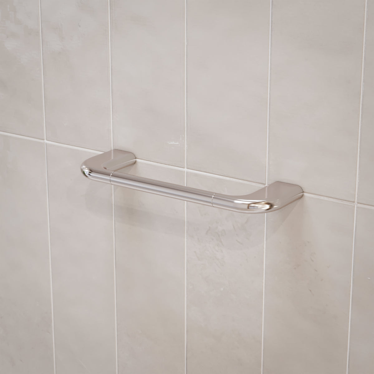 Caroma Contura II chrome hand towel rail on tiled bathroom wall, wall-mounted with smooth rounded ends