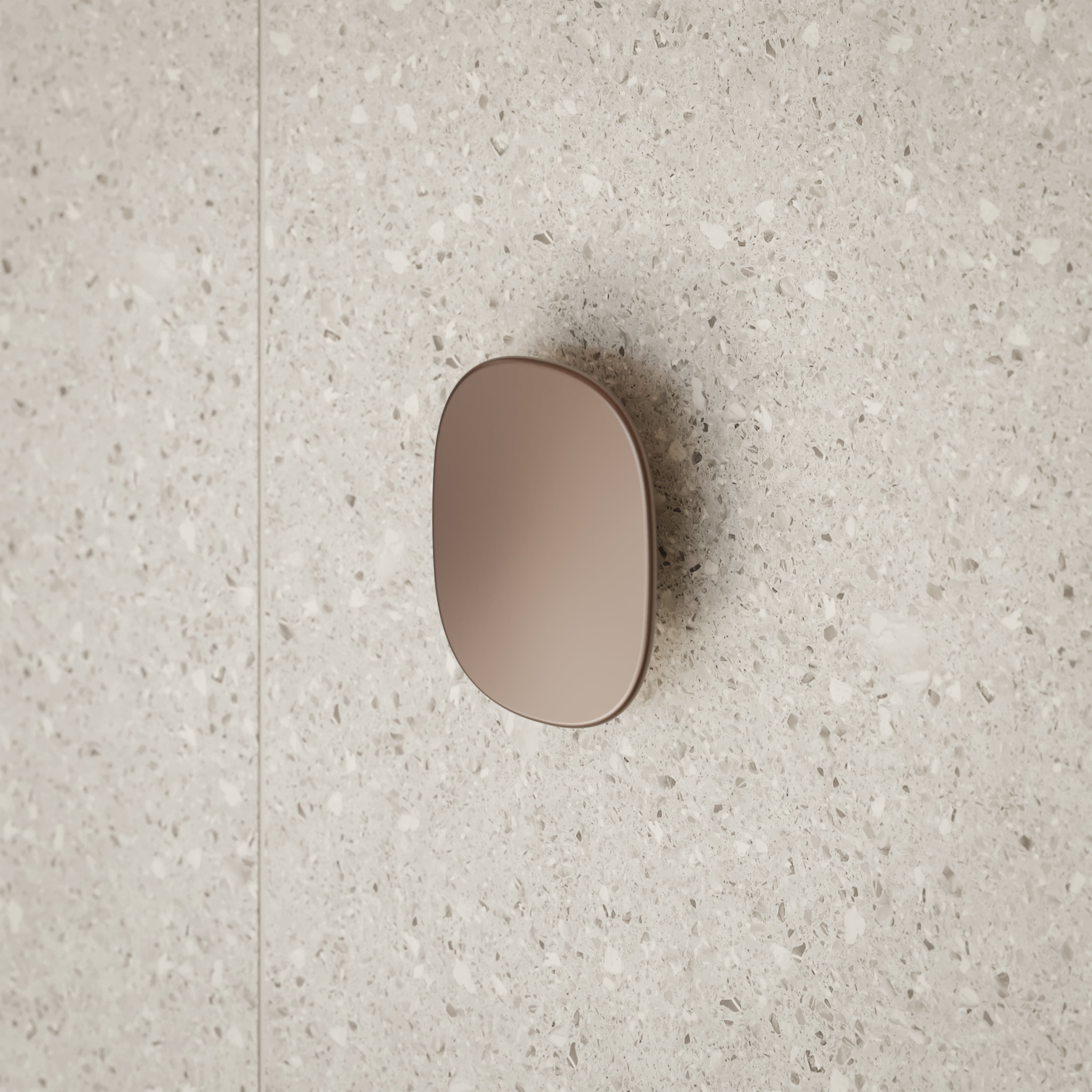 Caroma Contura II large robe hook in brushed bronze on speckled bathroom wall tile, side view