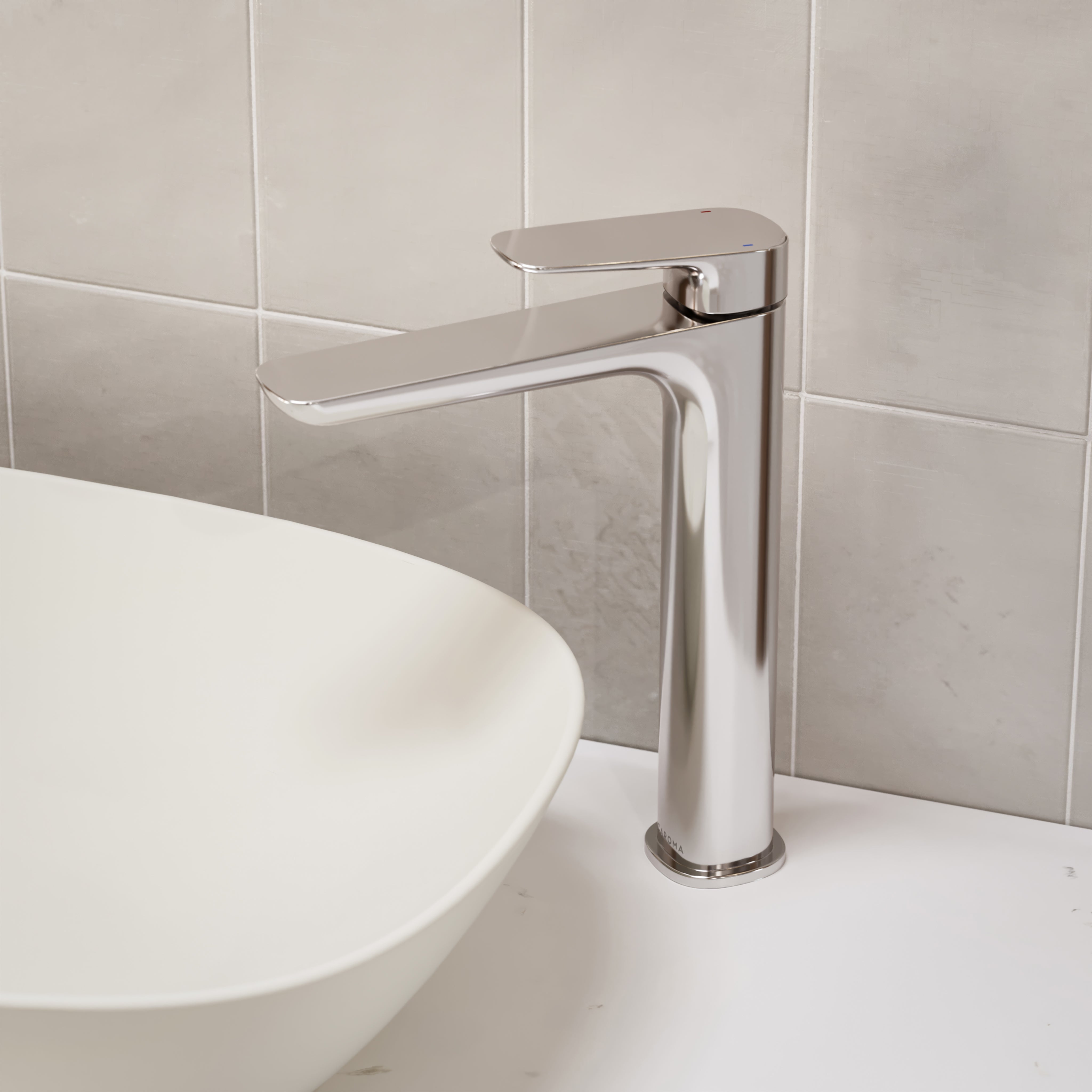 Caroma Contura II tower basin mixer in chrome, shown hob mounted beside a white above-counter basin.