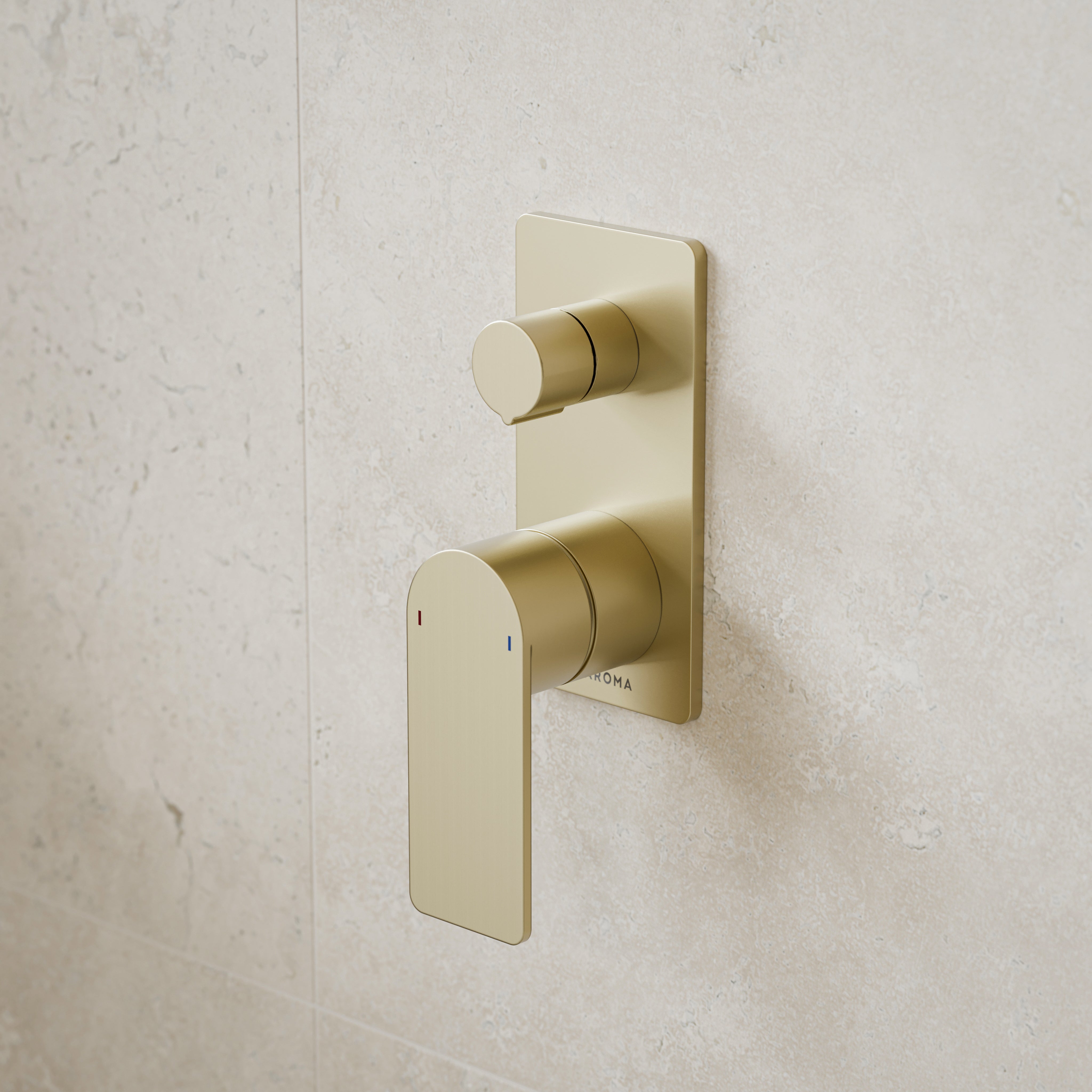 Caroma Urbane II brushed brass wall mixer with diverter, rectangular plate and lever handle on tiled bathroom wall