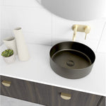 Marquis Chifley wall hung vanity with dark woodgrain drawers, white top, black round basin and brushed brass tapware