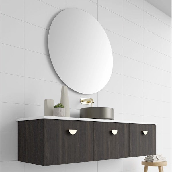Marquis Chifley wall hung vanity in dark woodgrain finish with white top, centre basin and brushed brass tapware