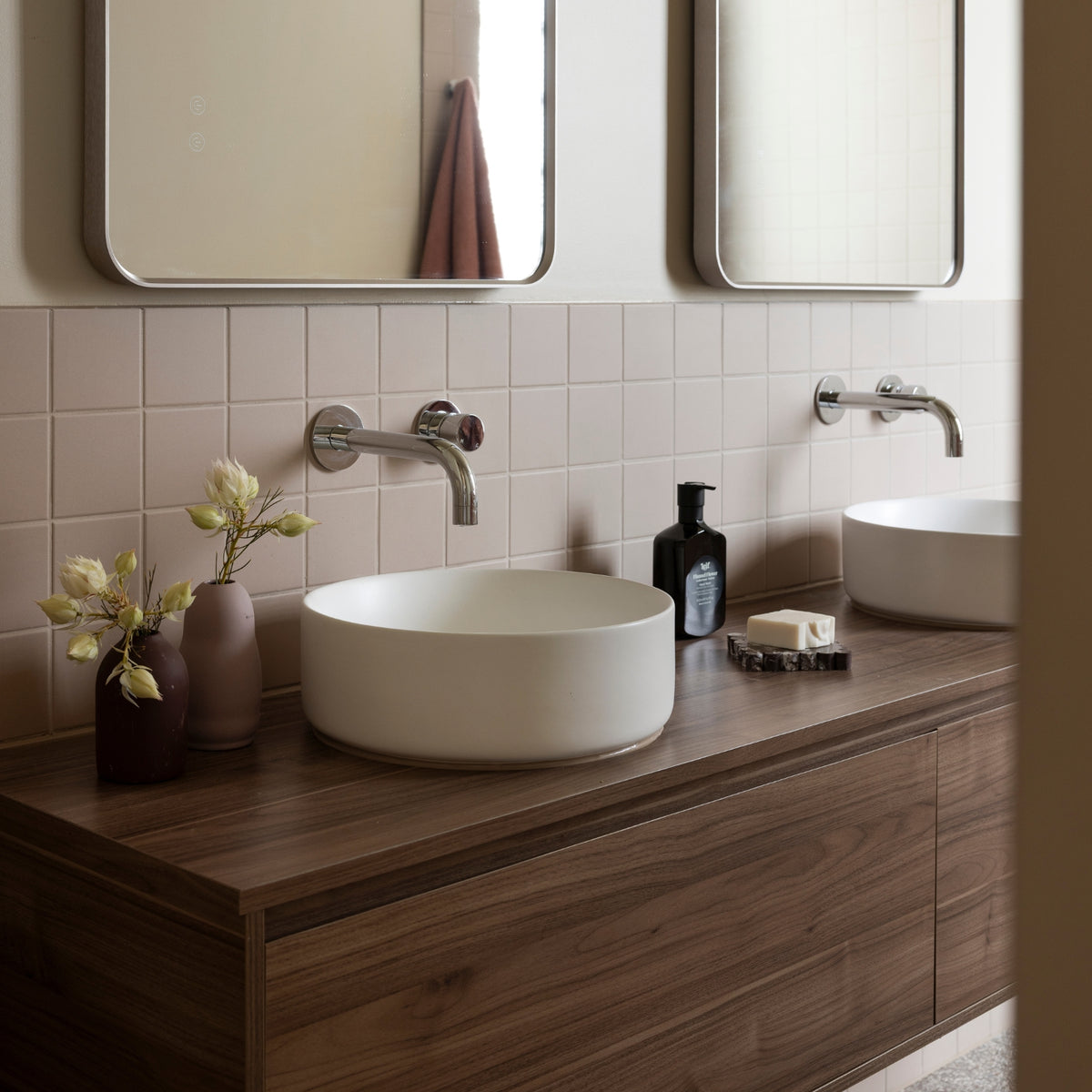 Timberline Delaware wall hung vanity in woodgrain finish with white above counter basin in bathroom setting
