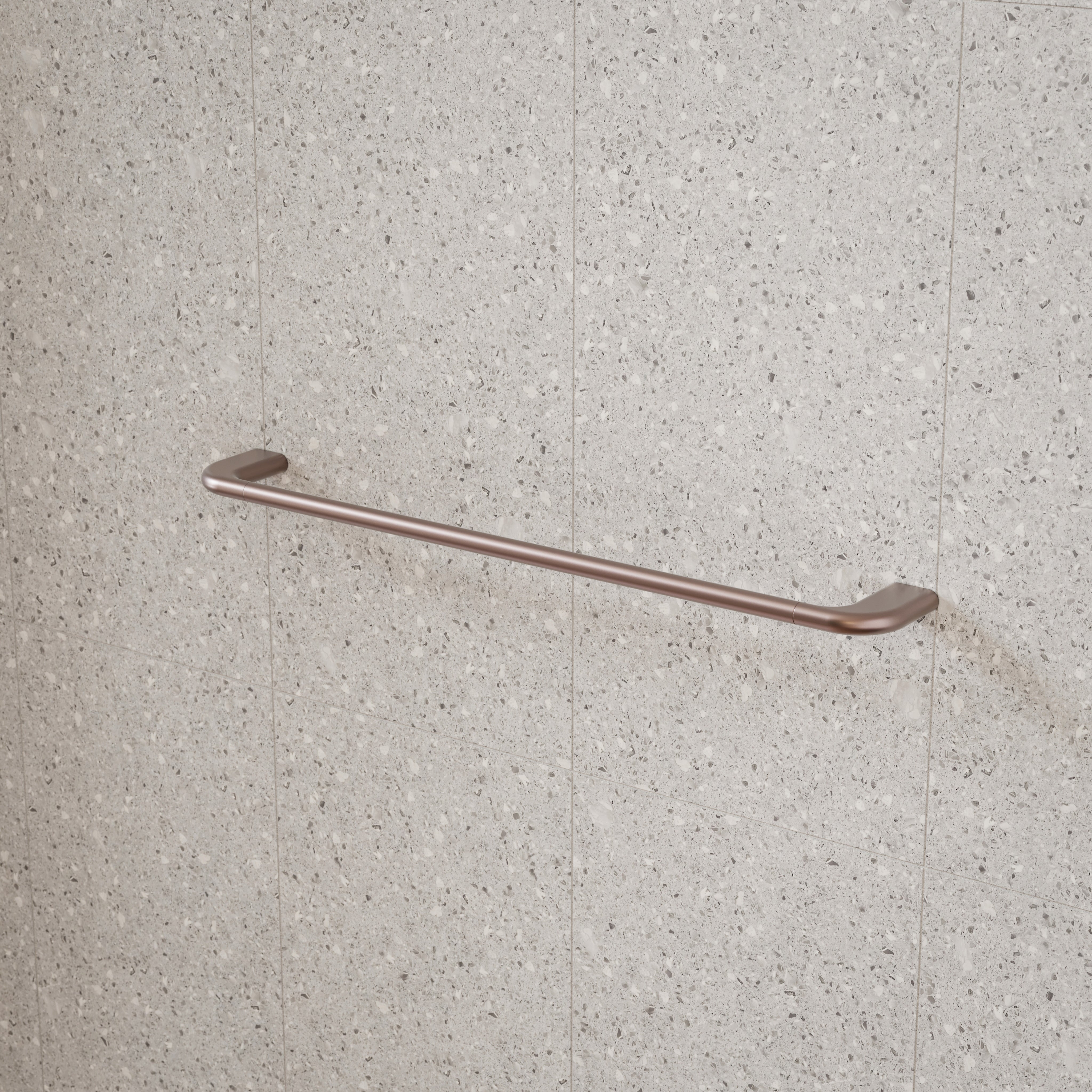 Caroma Contura II single towel rail in brushed bronze, mounted on a tiled bathroom wall, side view