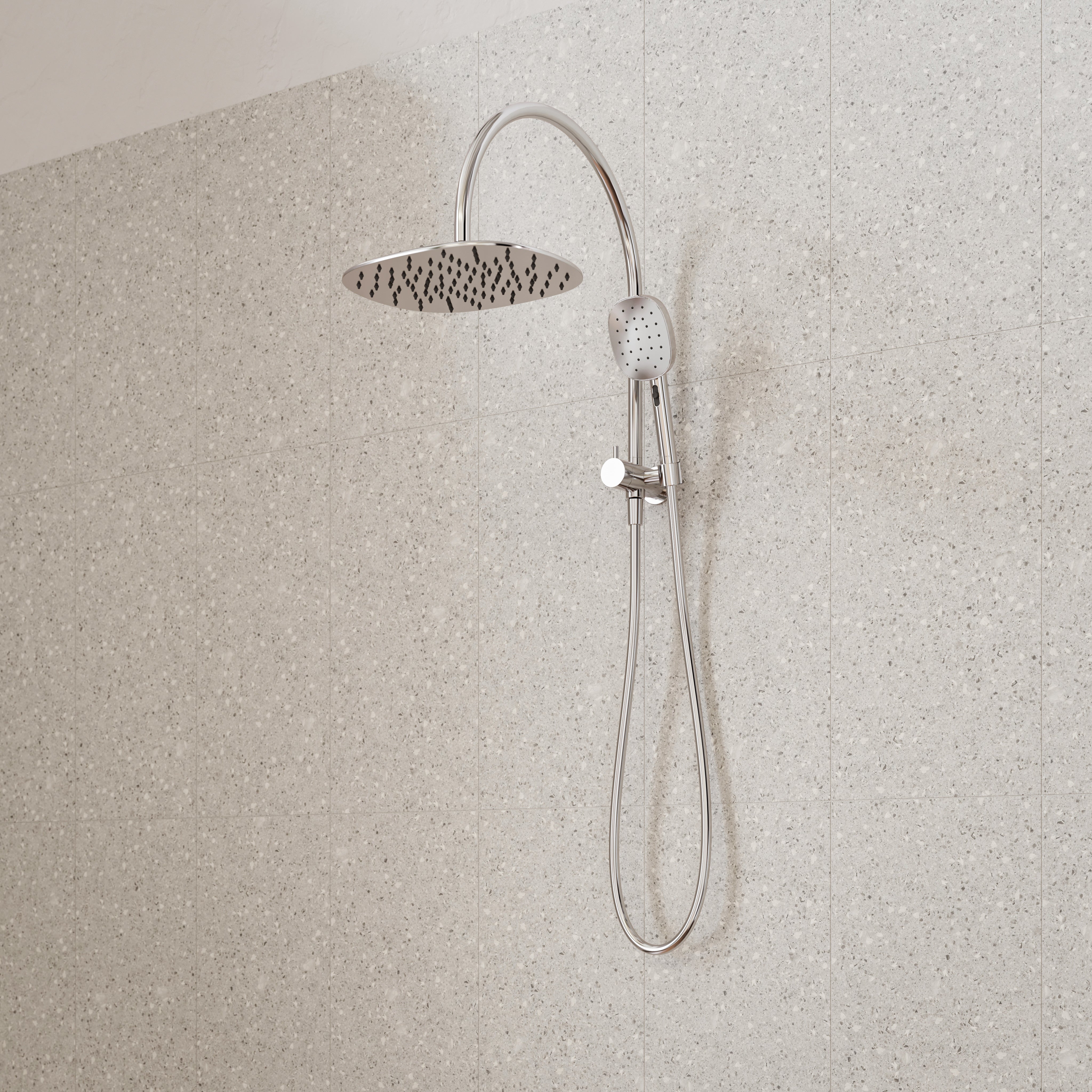 Caroma Contura II chrome twin shower with round overhead head, slide rail hand shower and hose on tiled wall