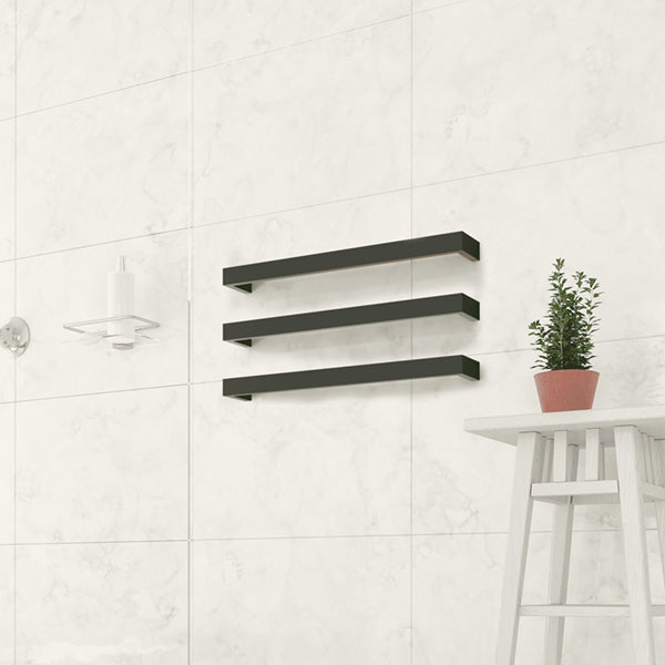 Thermogroup matte black single heated towel rail mounted on a tiled bathroom wall, shown with three stacked bars.