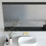 Marquis Flynn rectangular mirror with shelf in dark finish, shown above a bathroom basin in a tiled wall setting