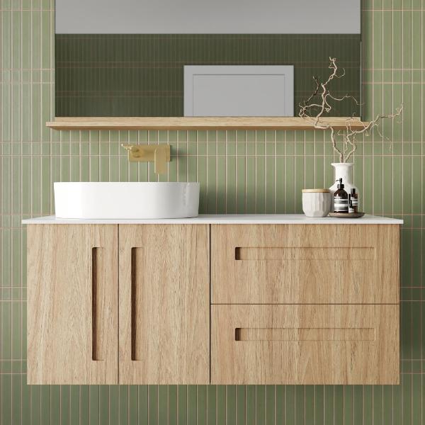 Marquis Gold wall hung vanity in natural oak with white above-counter basin, mixed drawers and doors, front view
