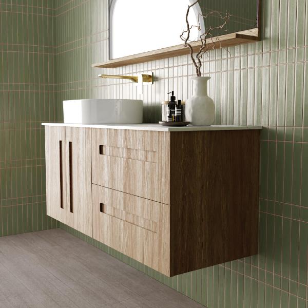 Marquis Gold wall hung vanity in natural oak with white basin and recessed fingerpull drawers in a bathroom setting