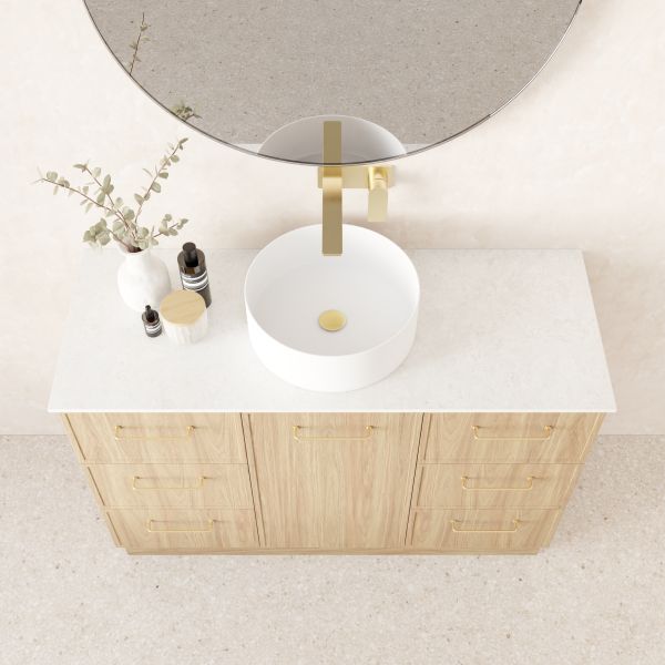 Marquis Hamilton floor standing vanity in prime oak with white solid surface top, round basin and brushed brass handles, top view