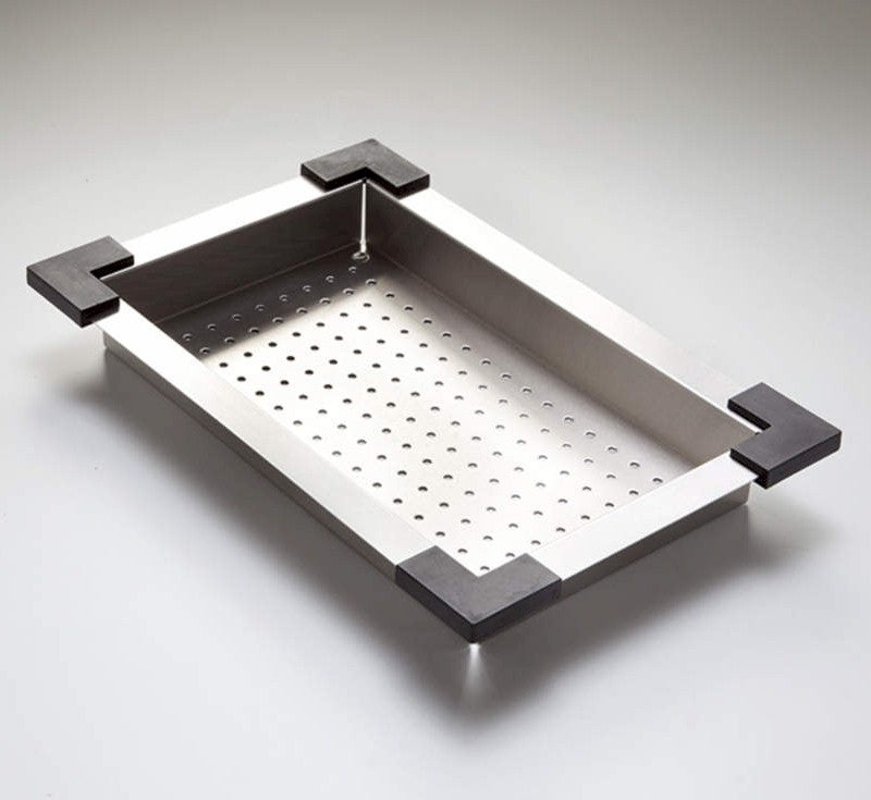 Oliveri stainless steel sink colander with perforated base and black corner handles, angled view