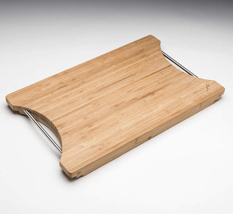 Oliveri Santorini bamboo chopping board with curved handles, natural wood finish, angled view