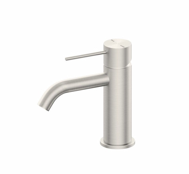 Nero Mecca basin mixer in brushed nickel, slim modern tap with curved spout and lever handle on white background