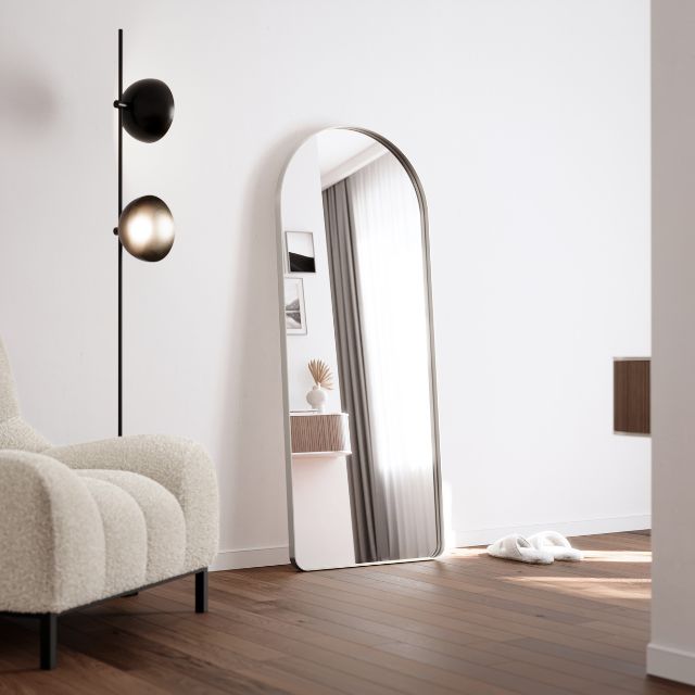 Ingrain brushed nickel arch full length mirror, floor standing in bedroom setting